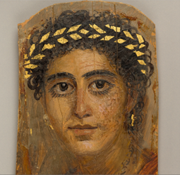 An image of Roman artwork depicting a woman's face.