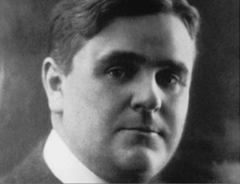 A headshot photograph of a man.