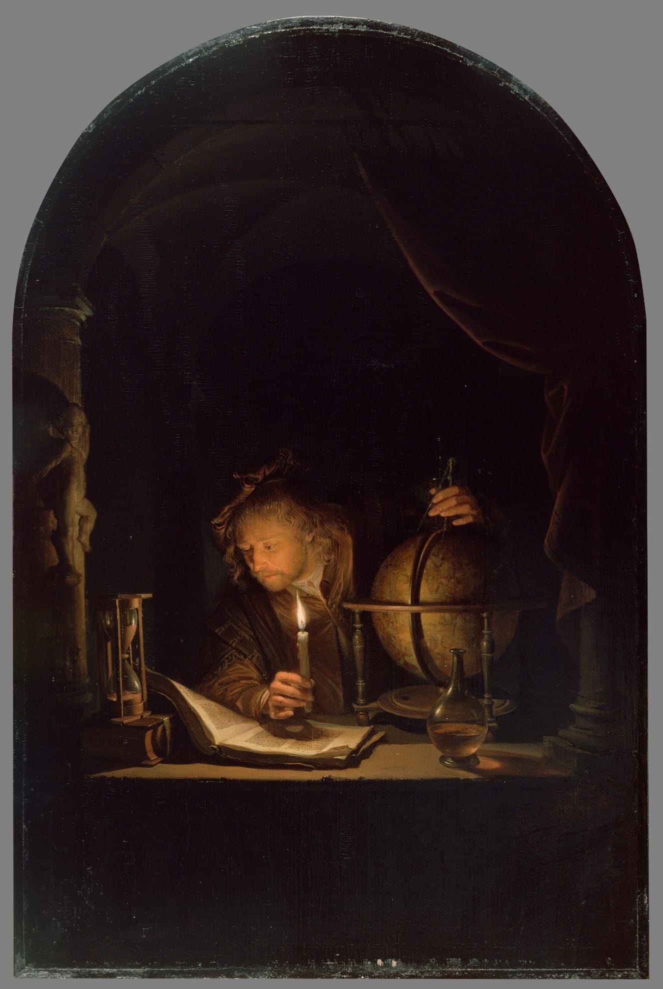 A Rennaisance painting depicting a man working by candelight, surrounded by scientific instruments.
