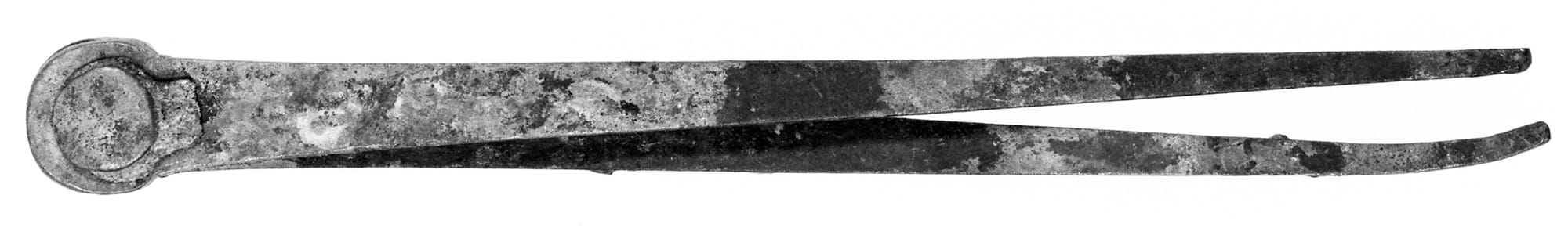An image of ancient compass calipers.