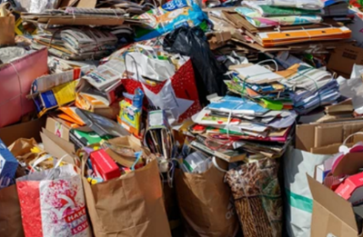 A photograph of shopping bags full of second-hand books.